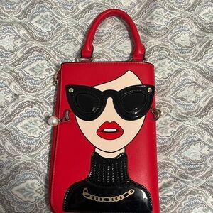 Stylish Red Handbag with Graphic Design